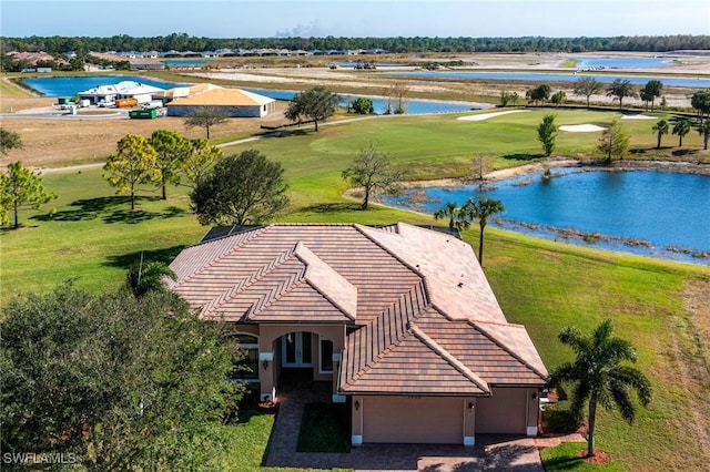 drone / aerial view with a water view