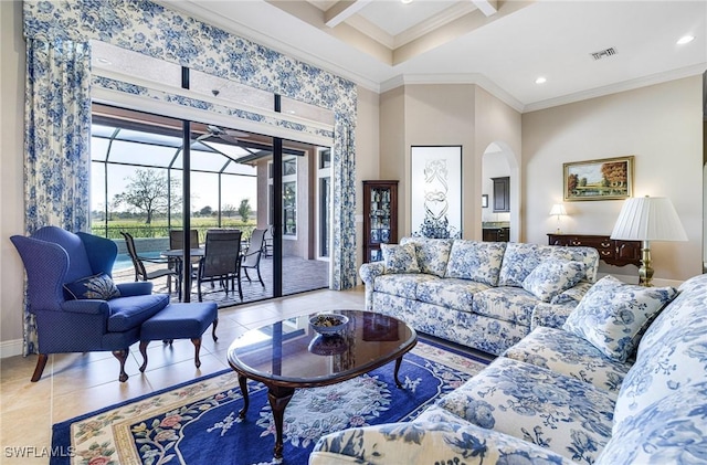 living room featuring tile patterned flooring, beam ceiling, and crown molding