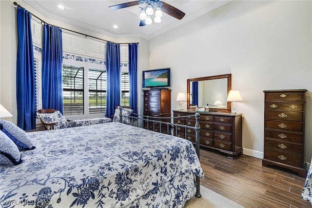 bedroom with ceiling fan, crown molding, and dark hardwood / wood-style floors