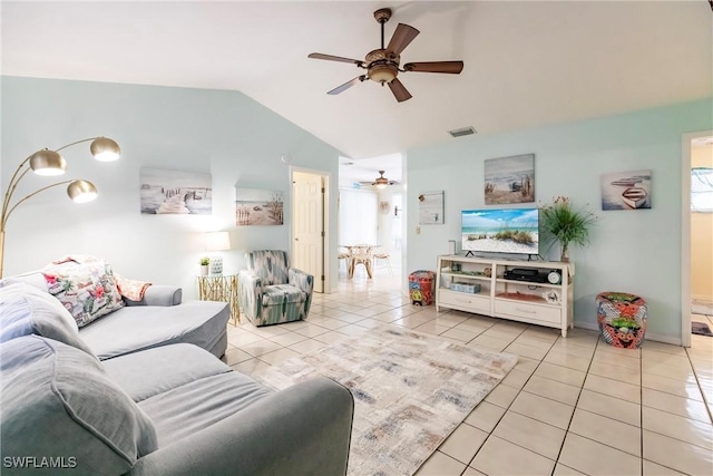 tiled living room featuring vaulted ceiling and ceiling fan