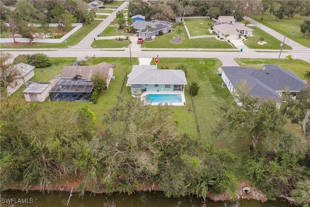 bird's eye view with a water view