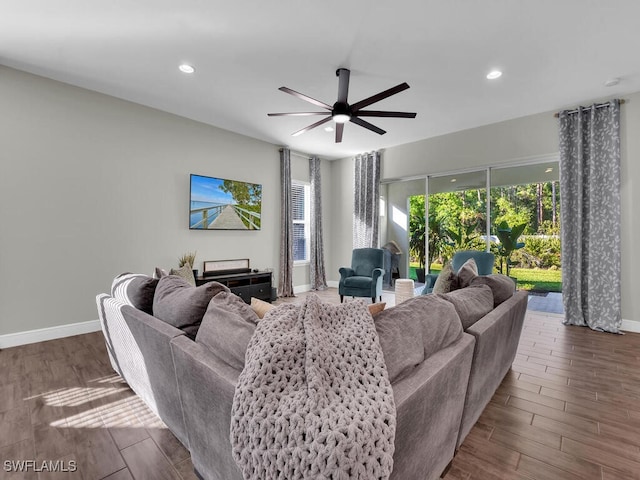 living area featuring recessed lighting, ceiling fan, baseboards, and wood finish floors