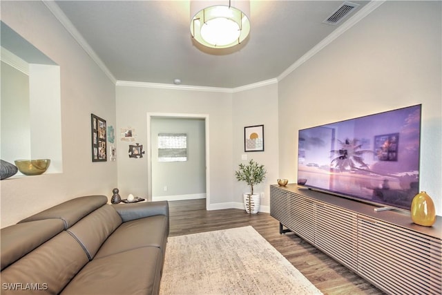 living room with hardwood / wood-style floors and ornamental molding