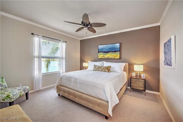 bedroom with ceiling fan, light carpet, and ornamental molding