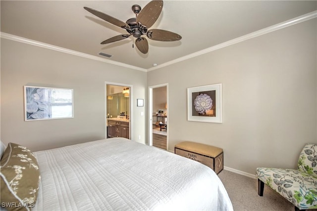 carpeted bedroom featuring ensuite bath, ceiling fan, and ornamental molding