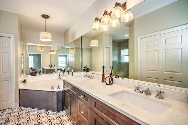 bathroom featuring tile patterned floors, vanity, and independent shower and bath