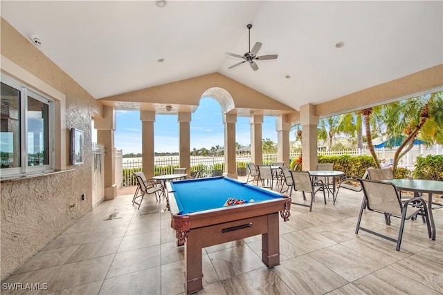 playroom featuring ceiling fan, vaulted ceiling, and billiards