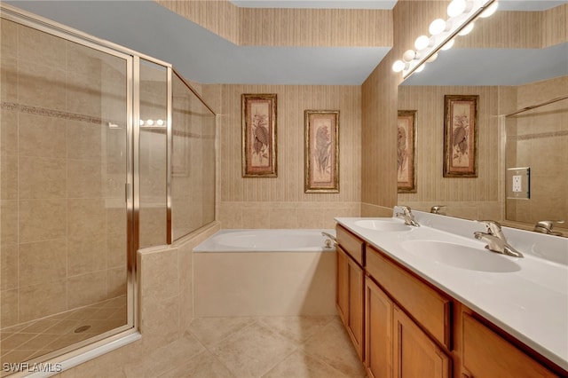 bathroom featuring tile patterned floors, vanity, and plus walk in shower