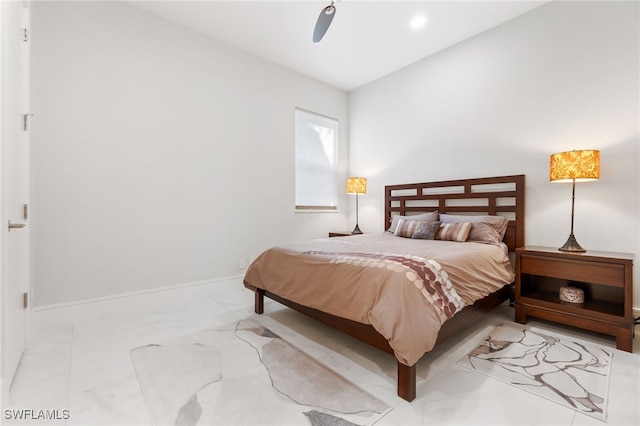 bedroom featuring ceiling fan and vaulted ceiling