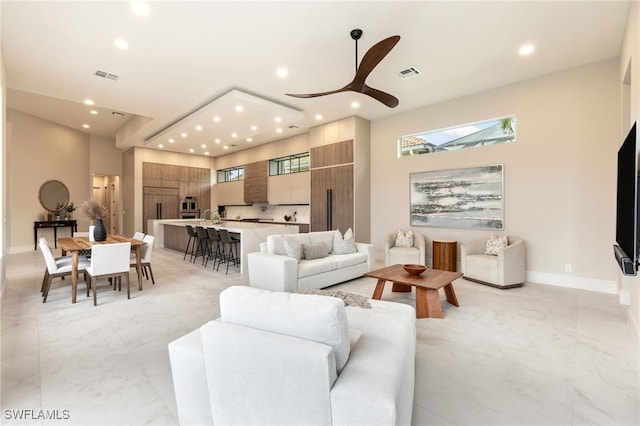 living room with ceiling fan