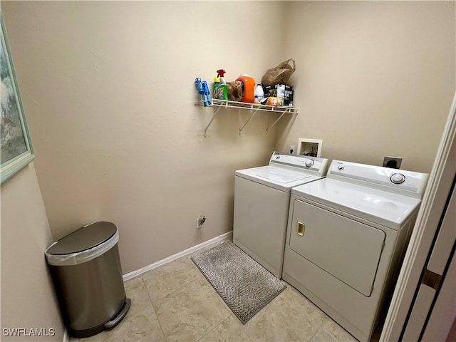 laundry area with washing machine and dryer