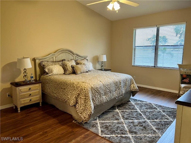 bedroom with ceiling fan and dark wood-type flooring