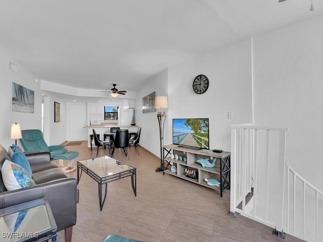 living room with ceiling fan