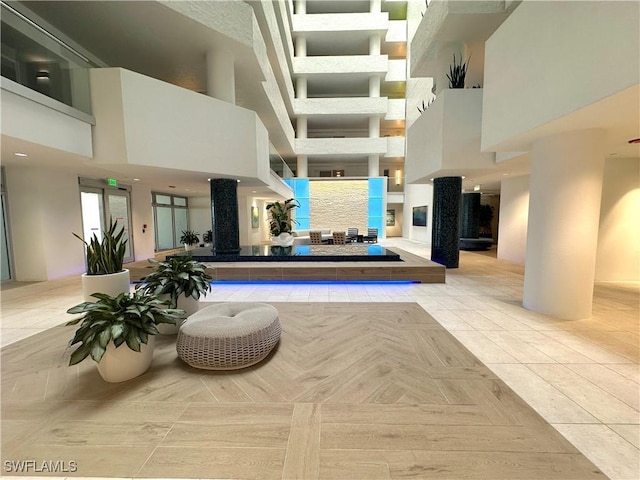building lobby featuring a high ceiling