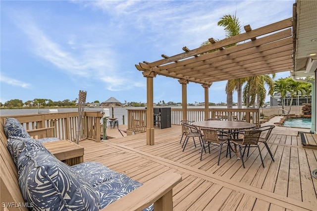 wooden deck with outdoor dining area and a pergola