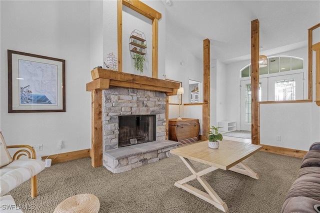 carpeted living room with a fireplace