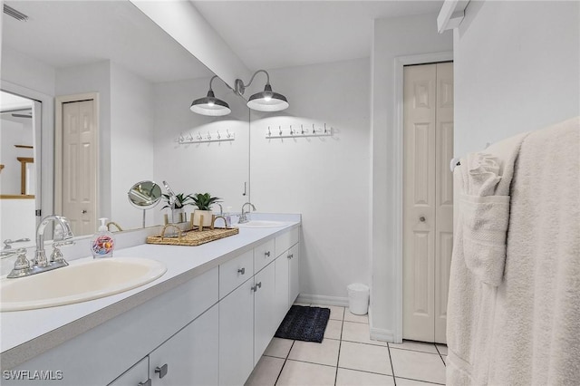 bathroom with vanity and tile patterned floors