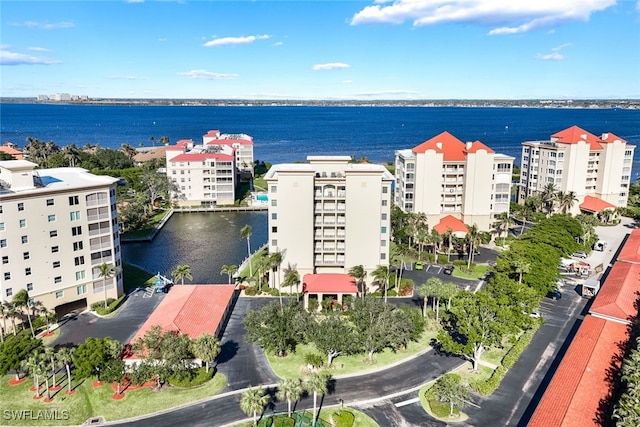 birds eye view of property featuring a water view