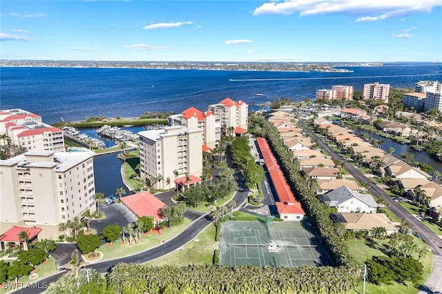 birds eye view of property featuring a water view