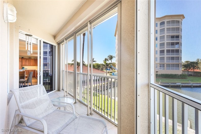 balcony featuring a water view