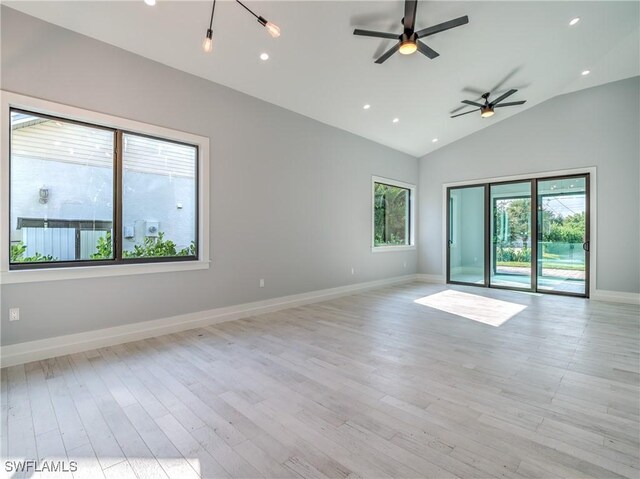 19871 Adams Rd, Fort Myers, FL 33908 - empty room with ceiling fan, light wood-type flooring, vaulted ceiling, and baseboards