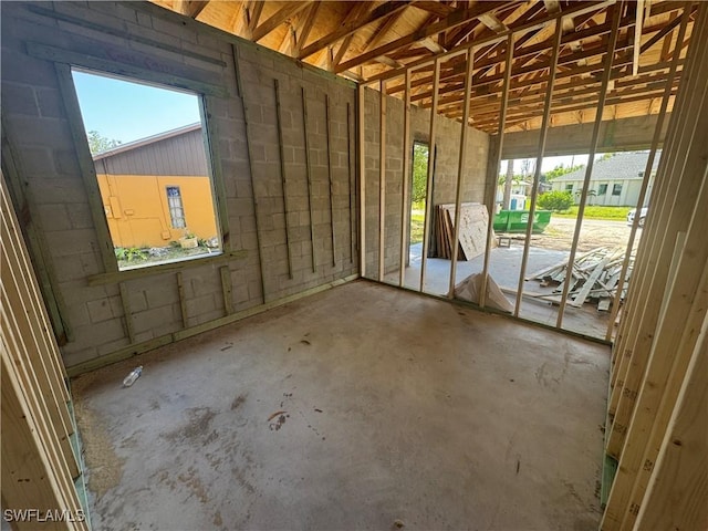 19871 Adams Rd, Fort Myers, FL 33908 - miscellaneous room featuring unfinished concrete floors
