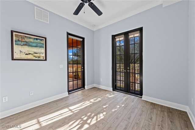 unfurnished room with french doors, light hardwood / wood-style floors, ceiling fan, and ornamental molding