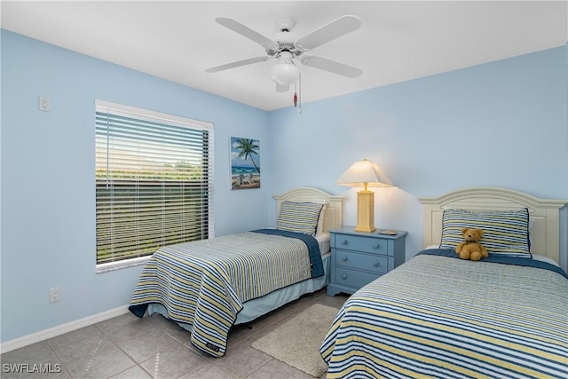 bedroom featuring ceiling fan and light tile patterned flooring