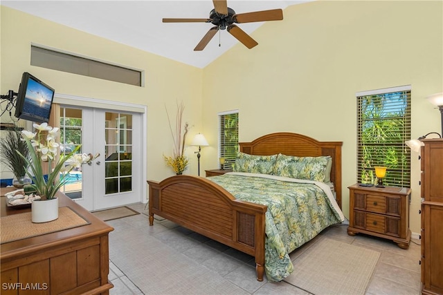 tiled bedroom featuring french doors, access to outside, high vaulted ceiling, and ceiling fan