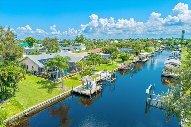 drone / aerial view with a water view