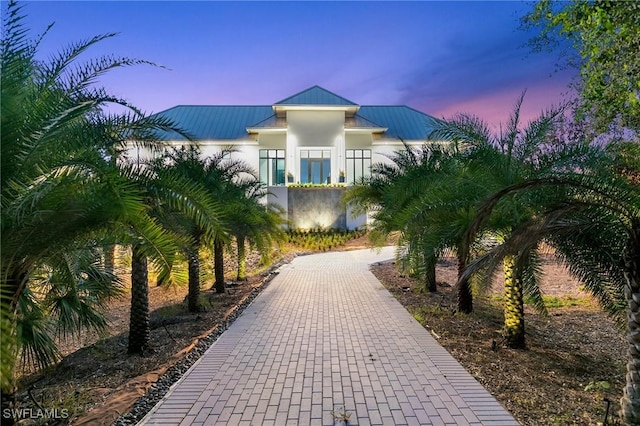 exterior space with decorative driveway