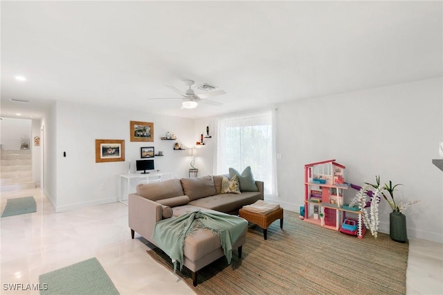 living room with stairway, baseboards, and visible vents