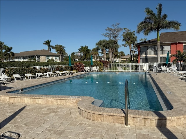 view of pool featuring a patio