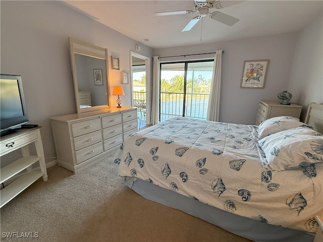 bedroom with access to exterior, carpet flooring, and ceiling fan