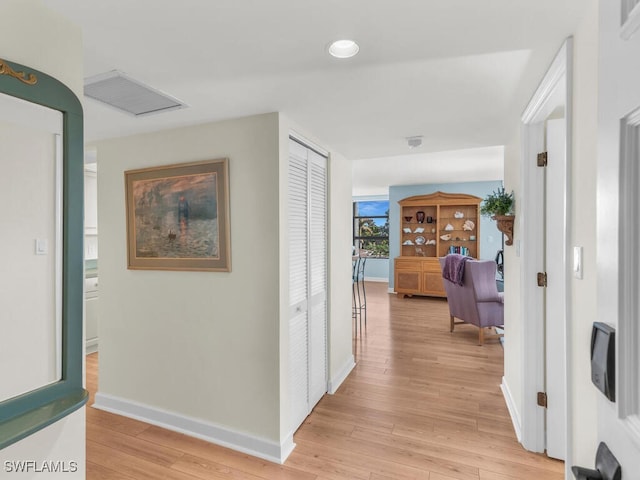 hallway featuring light wood-type flooring