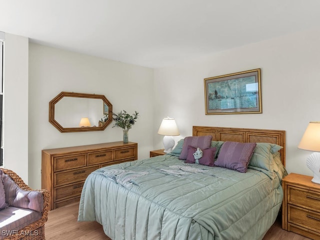 bedroom with light wood-type flooring