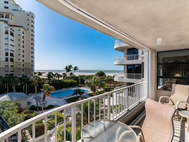 balcony featuring a water view