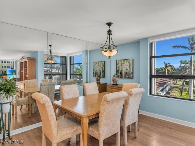 dining space featuring light hardwood / wood-style flooring