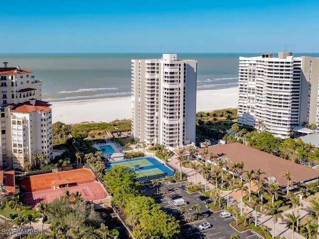 bird's eye view with a beach view and a water view