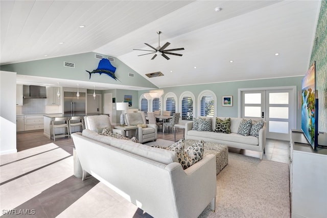 tiled living room with french doors, high vaulted ceiling, ceiling fan, and wood ceiling