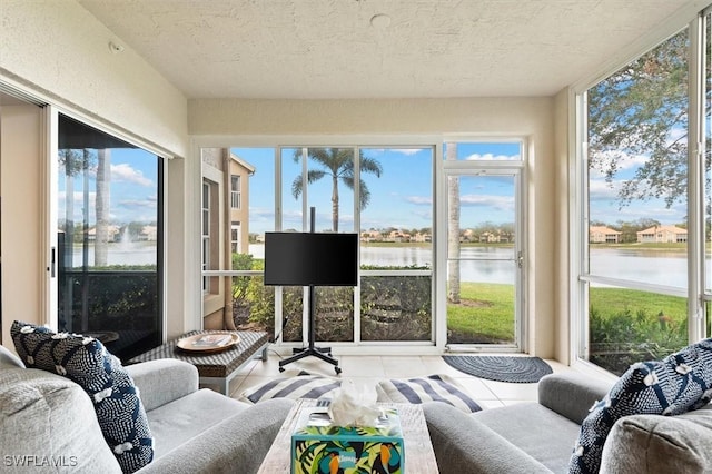 sunroom with a water view