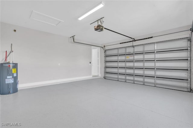 garage featuring a garage door opener, electric water heater, and baseboards