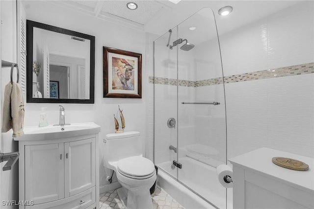 bathroom featuring vanity, an enclosed shower, and toilet