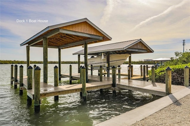 view of dock with a water view