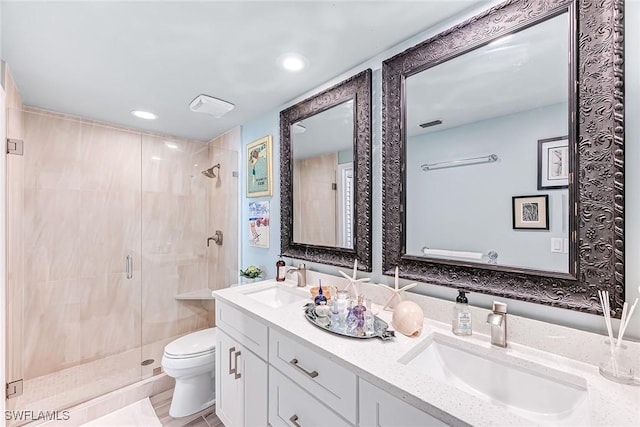 788 Willowbrook Dr Unit 502, Naples, FL 34108 - full bathroom featuring toilet, a shower stall, double vanity, and recessed lighting