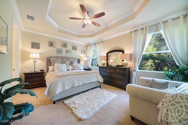 6502 Monterey Pt Unit 202, Naples, FL 34105 - bedroom with a raised ceiling, carpet floors, crown molding, and a ceiling fan