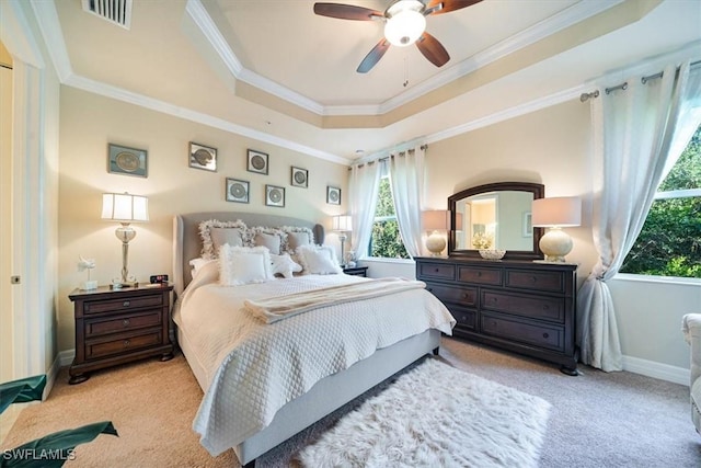 6502 Monterey Pt Unit 202, Naples, FL 34105 - carpeted bedroom featuring a raised ceiling, ornamental molding, and ceiling fan
