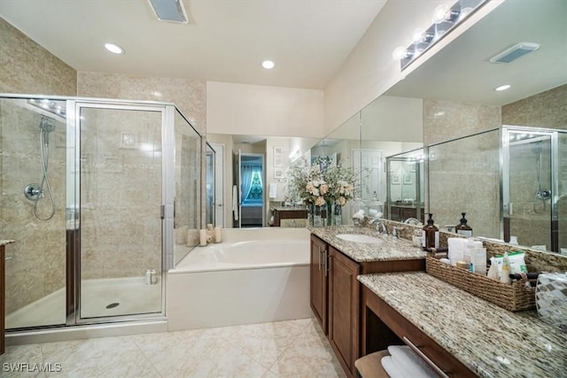 6502 Monterey Pt Unit 202, Naples, FL 34105 - full bath with vanity, a bath, a shower stall, and recessed lighting