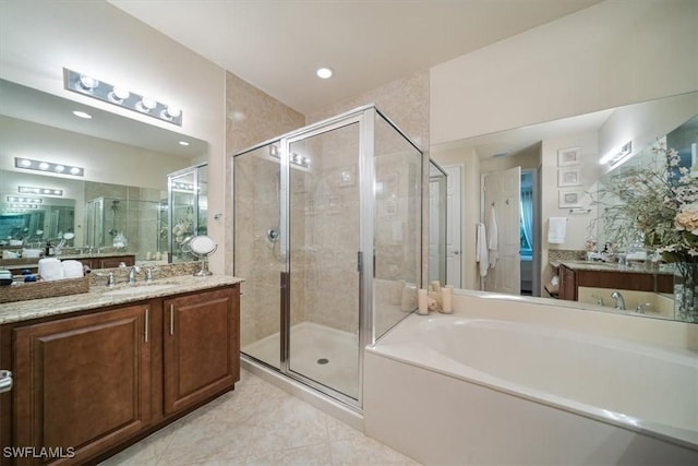 6502 Monterey Pt Unit 202, Naples, FL 34105 - full bath with a bath, a stall shower, vanity, and tile patterned floors