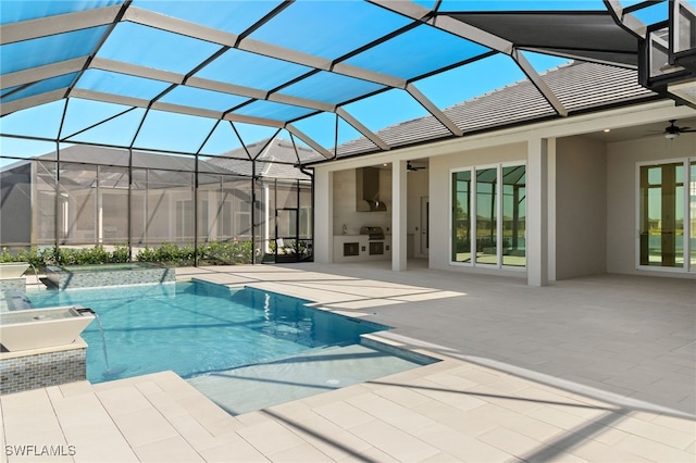 view of swimming pool featuring a lanai, a patio area, ceiling fan, and area for grilling